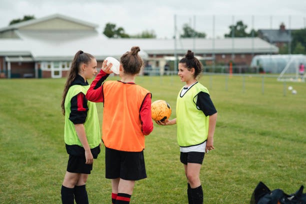 istock Talking After Football Practice 1162804106