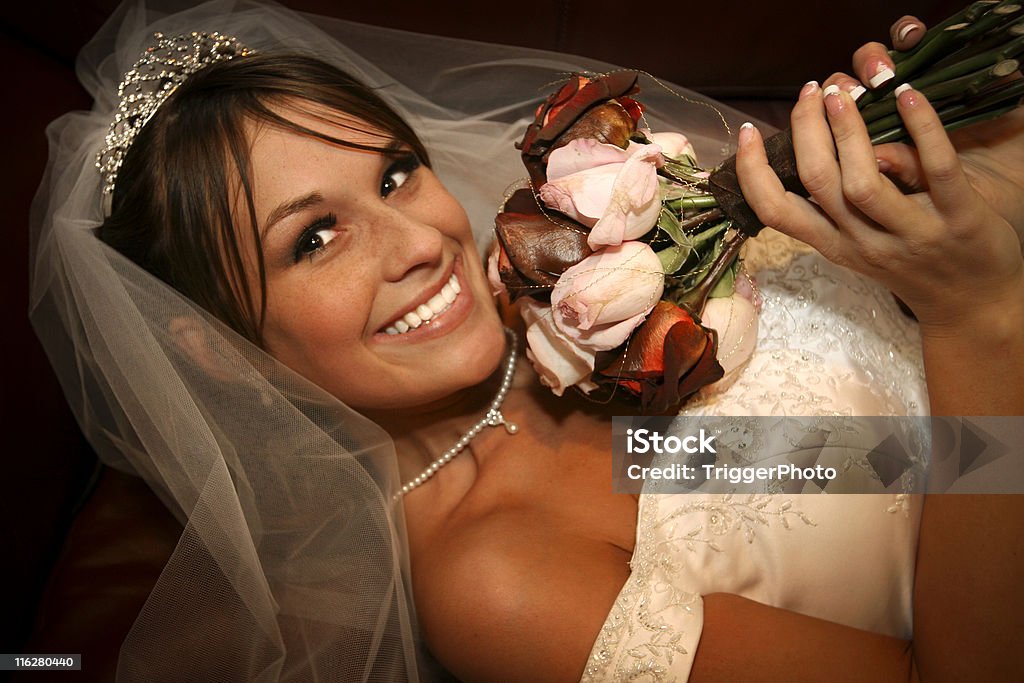 Beautiful Bridal Portraits pretty girl lying down. Wedding Stock Photo