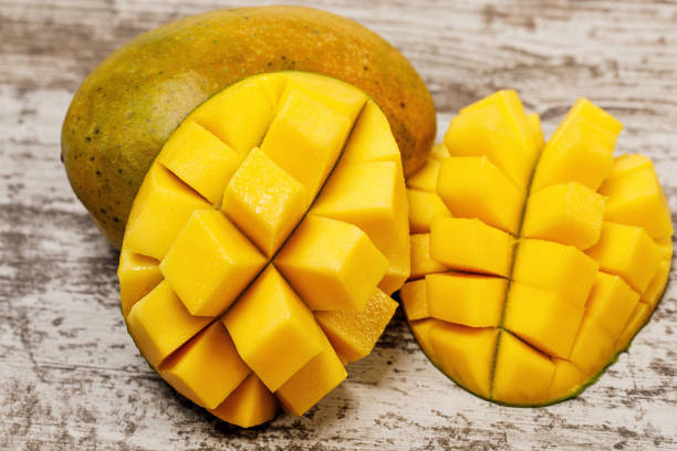 istock fresh juicy yellow Thai chopped mango on the table 1162805209
