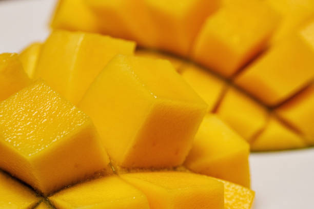 istock fresh juicy yellow Thai chopped mango on the table 1162806234