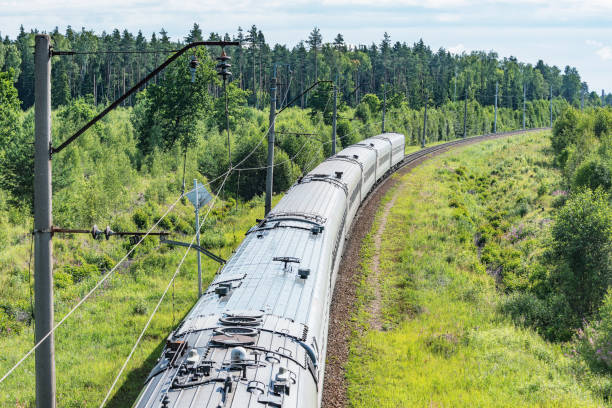 istock Passenger train approaches to the station. 1162807104