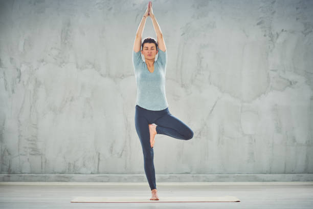 istock Woman doing yoga. 1162808216