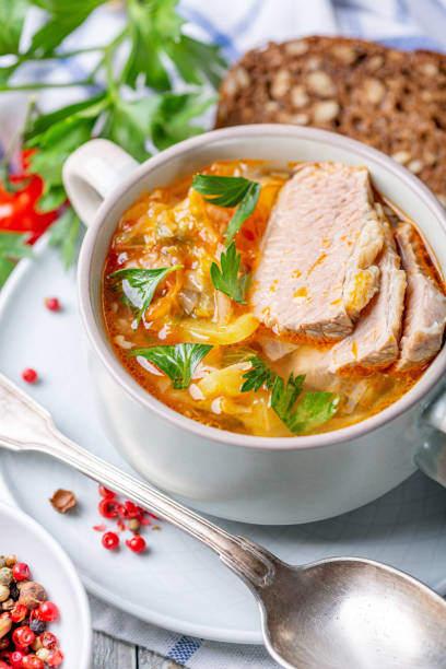 istock Traditional soup with fresh cabbage and meat. 1162810806