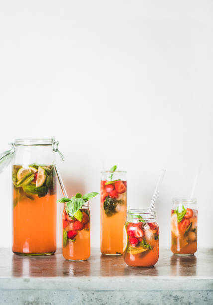 istock Fresh homemade lemonade or iced-tea with strawberry and basil 1162812399