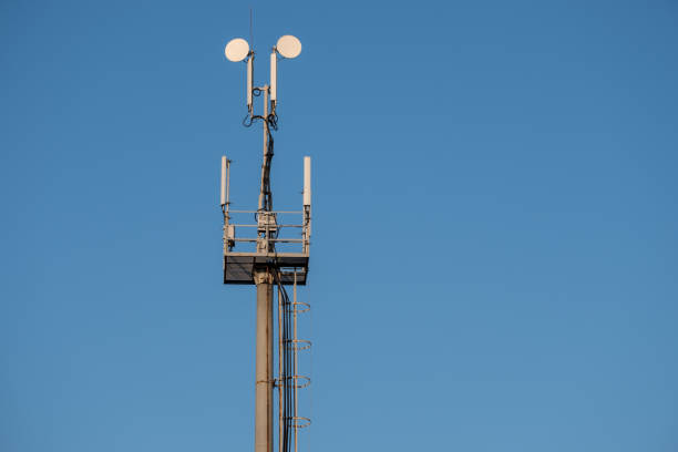 istock a cell phone tower in the blue sky 1162816131