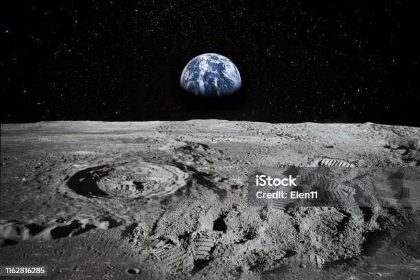 View Of Moon Limb With Earth Rising On The Horizon Footprints As An Evidence Of People Being There Or Great Forgery Collage Elements Of This Image Furnished By Nasa Stock Photo - Download Image Now