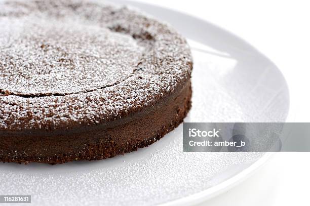 French Style Chocolate Cake In White Background Stock Photo - Download Image Now - Chocolate Cake, Powdered Sugar, Simplicity