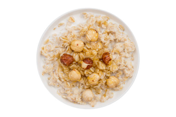 istock Oatmeal with hazelnut and honey 1162820770