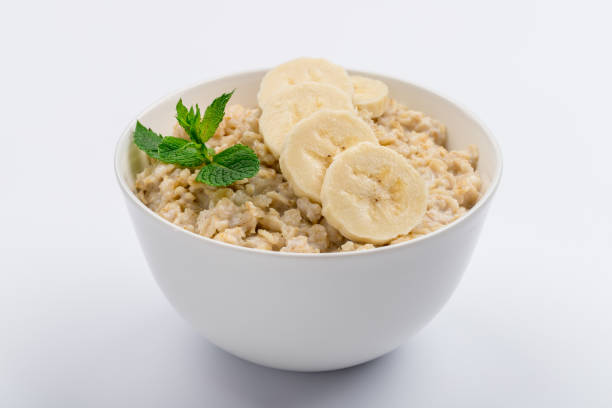 istock Oatmeal with banana and mint isolated 1162820779