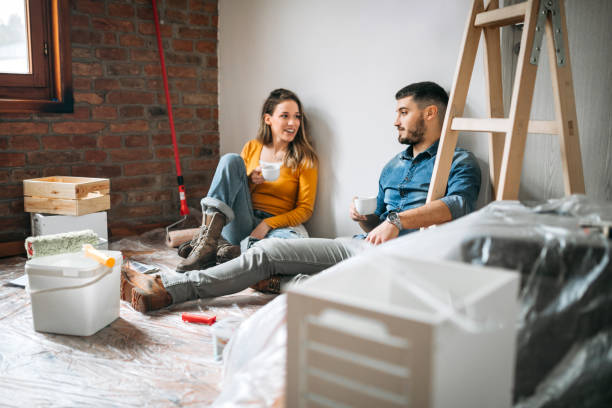 istock Couple planning interior design, having coffee 1162821456