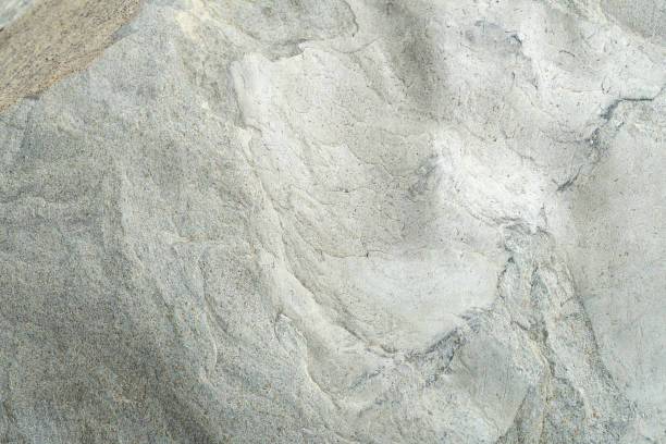 istock Modern white wall. This is a horizontal cement-concrete background. Grunge abstract stone. 1162827584