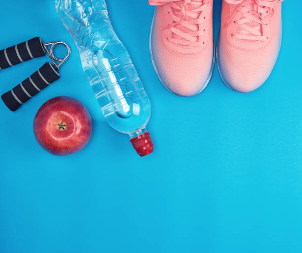istock sportswear and pink sneakers with laces 1162827601