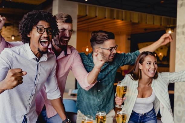 istock friends are watching a sports 1162831631