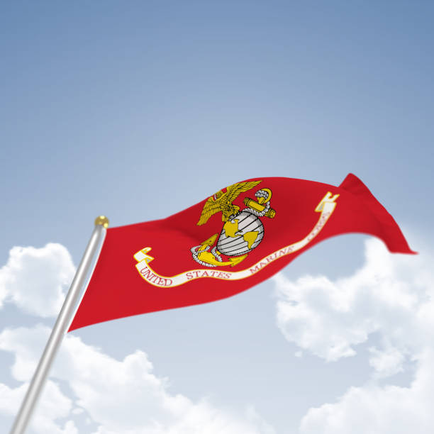 US Marines Flag US Marines Flag on blue sky background blowing in the wind us marine corps stock pictures, royalty-free photos & images