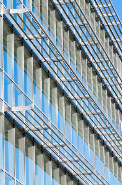 istock Windows of a tall office and apartment block 1162833416