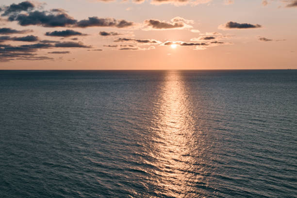 istock Dramatic skies over the blue sea just before sunset in northern Denmark. 1162833441