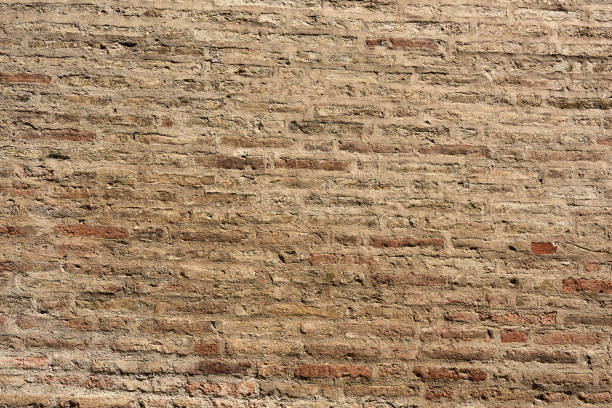 istock An old brickwall as background from a medieval city in Le Marche, Italy. 1162833447