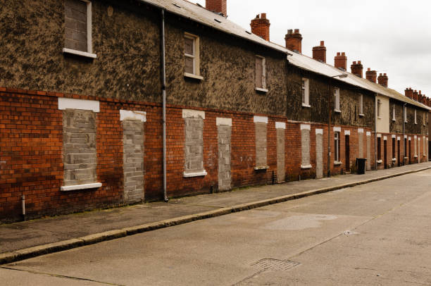 Blocked up terraced houses ready for demolition.