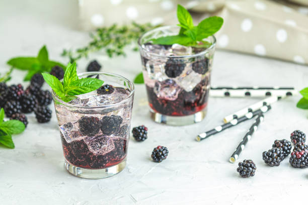 istock Cold summer berry drink with blackberries 1162836957