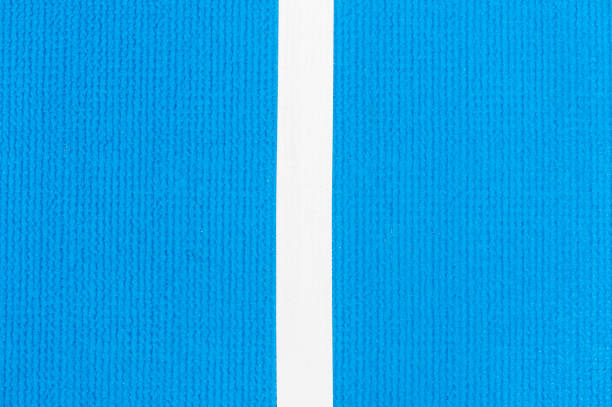 istock Blue running track synthetic rubber on the athletic stadium. 1162837945