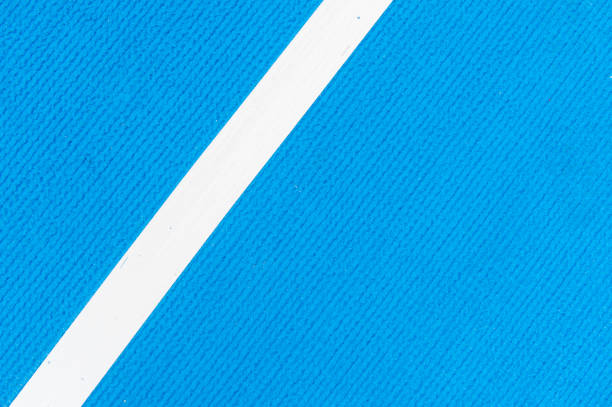 istock Blue running track synthetic rubber on the athletic stadium. 1162838165