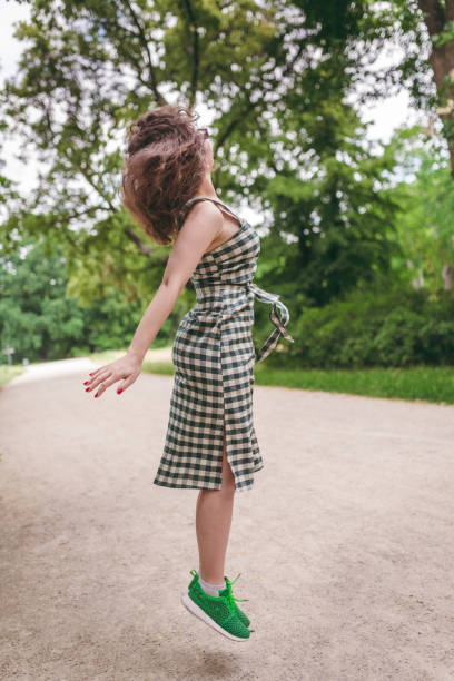 istock Happiness concept - happy woman having fun outdoors during summer 1162839410