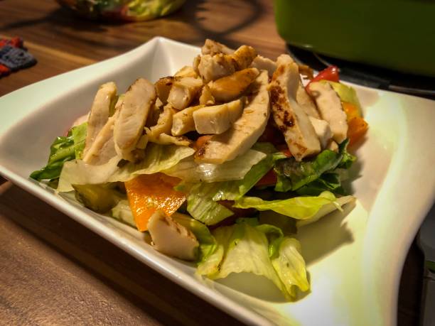 istock A tasty salad with chicken stripes 1162839627