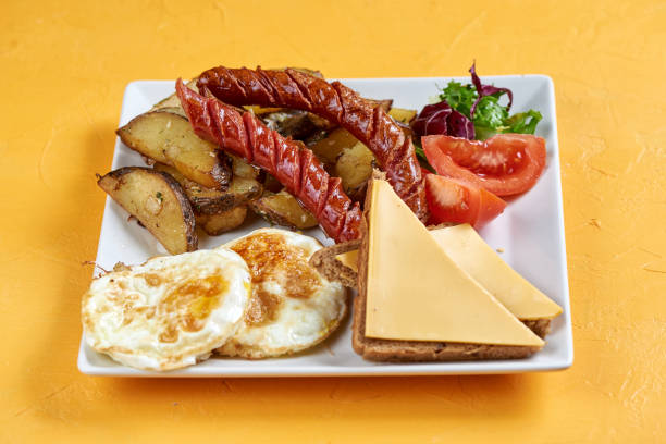 istock hearty breakfast of eggs, potatoes and sausage 1162840206