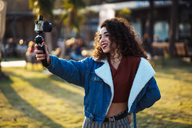 istock Young woman vlogging 1162840591