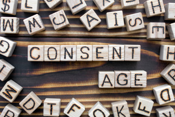 istock consent age wooden cubes with letters 1162841345