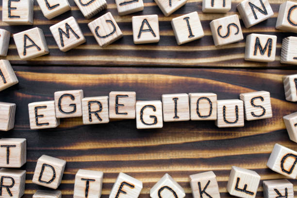 istock egregious wooden cubes with letters 1162841358