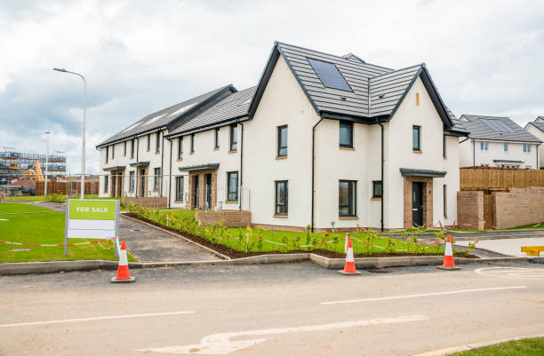 istock Newly built houses for sale in a housing development 1162850062