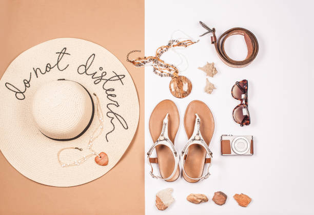 istock Summertime Vacation Accessories with Fashionable White Flat Sandals 1162853158