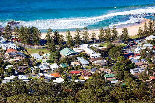 Aerial view of coastline town of Bulli NSW Australia, background with copy space, full frame horizontal composition