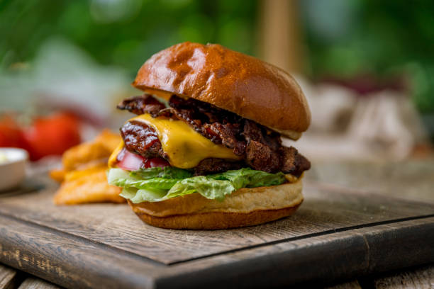 istock Burger with meat cheese and bacon 1162858685
