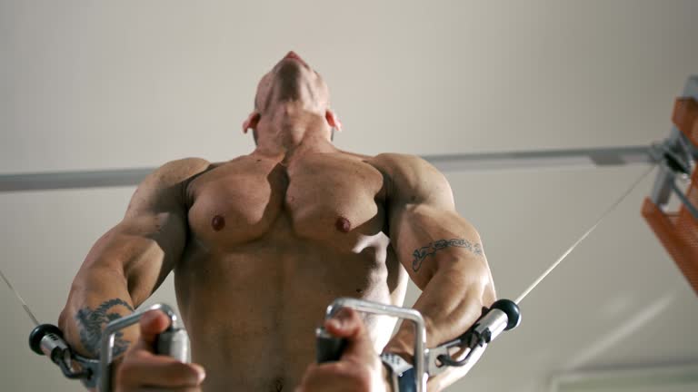 SLO MO Bodybuilder doing strength training