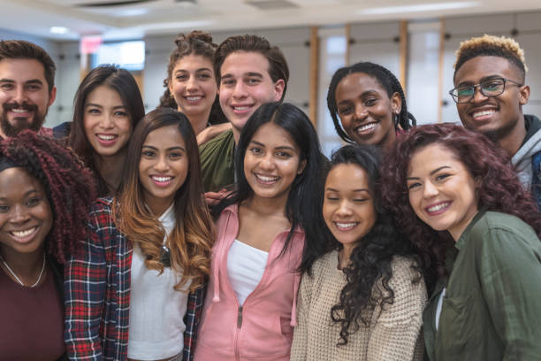 istock Multi-Ethnic Group of University Students Sitting Inside Together 1162863918