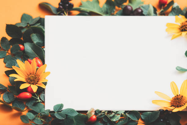 istock invitation white paper green floral frame orange 1162865134