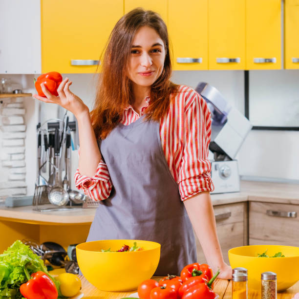 istock healthy diet lady kitchen organic bell pepper salad 1162865155