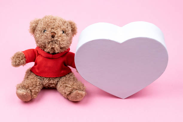 istock Teddy bear, white box hearts shaped, Valentines Day gift. Present for the christmas, thanks giving day, birthday holiday. 1162870723