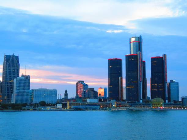 istock Vibrant city skyline along lakeside at twilight 1162872419