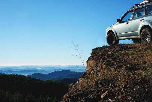 January 31, 2019 - Horton, Oregon, USA: A Subaru Forester modified for offroad use perched on a high cliff overlooking the Oregon Coast Range mountains