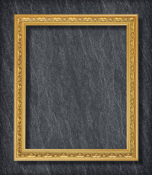 istock gold frame on Dark grey black slate background or texture. 1162882399