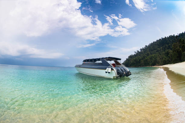 istock boat stop near the quiet beach 1162885819