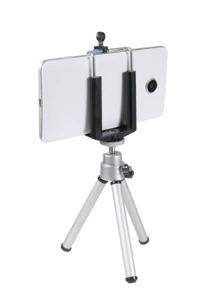 istock Mobile Phone isolated on tripod in white background 1162885832