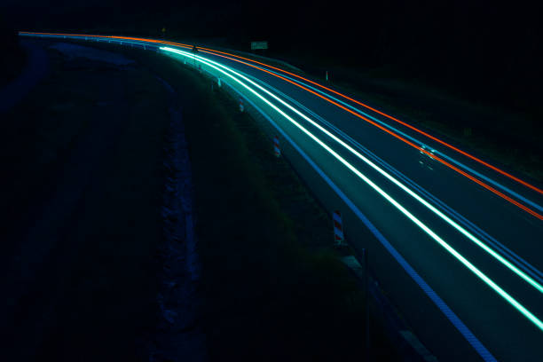 istock lights of cars with night 1162887691