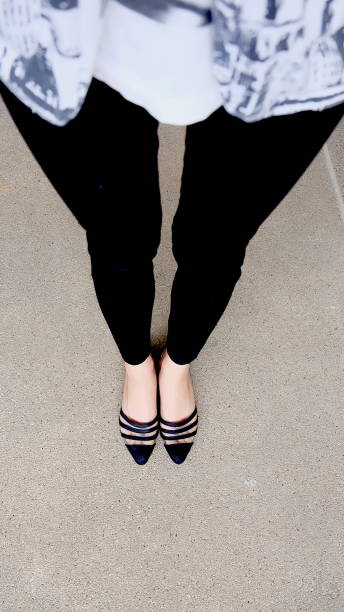 istock Low heel shoe on cement background, Top view. 1162889079