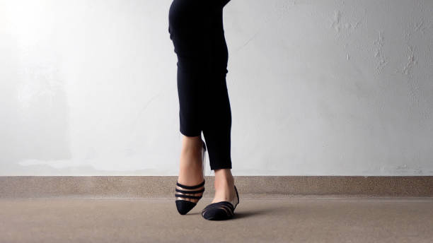 istock Low heel shoe on cement background, Top view. 1162889114