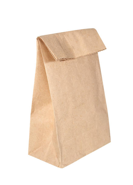 istock Brown Paper Bag Lunch with Copy Space Isolated on White Background. 1162891025