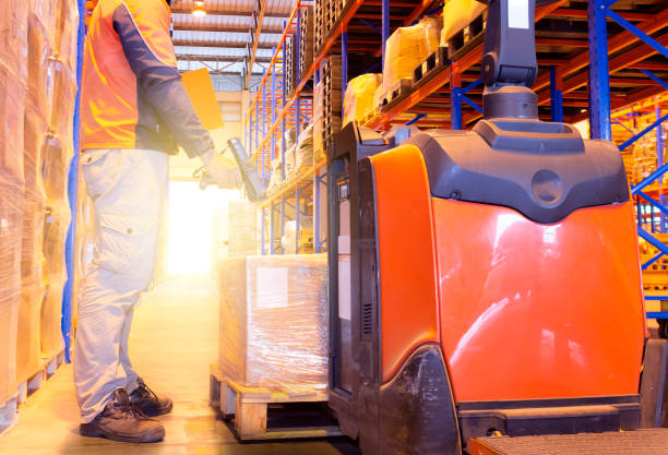 istock Warehouse worker is inventory management cargo in warehouse 1162891728